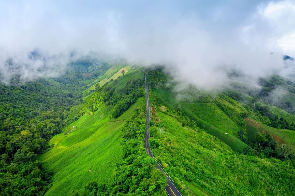 aerial-view-beautiful-sky-road-top-mountains-with-green-jungle-nan-province-thailand.jpg